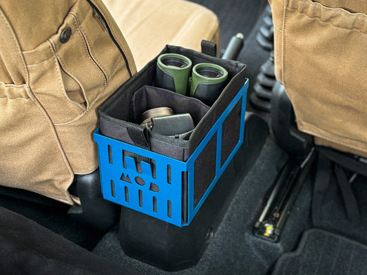 Caddy Box in Strong Blue with Black Caddy Pouch holding binoculars and a camera