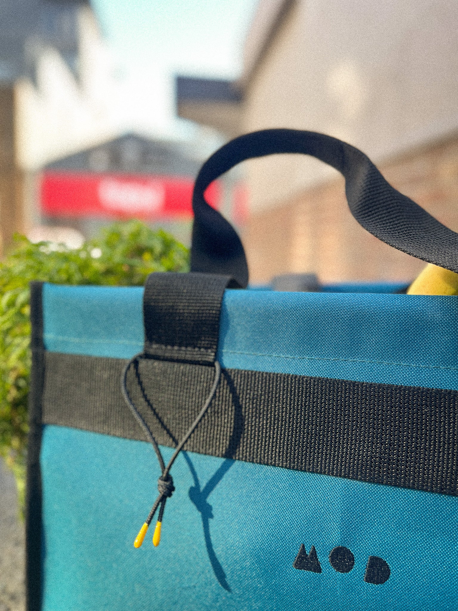 Cargo Tote in Teal showing a key holder detail