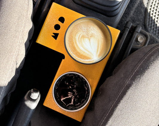 A coffee and drinks holder in a Jimny 3