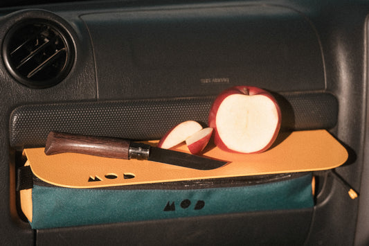 Dash Shelf in Jimny 3 in Yellow with cut apple on it and Dash Pouch