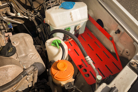 Engine Bay Mount in Red installed in Jimny 3 with washer bottle